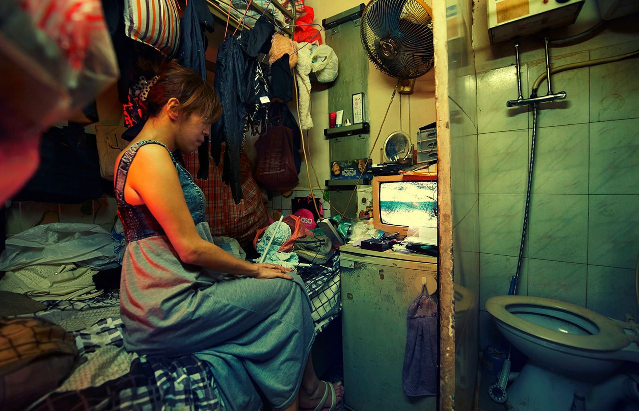 A subdivided unit in the Kowloon area of Hong Kong highlights the cramped conditions in which many are forced to live.