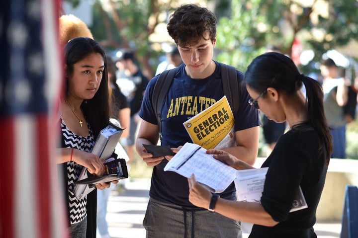 Students wait in line to vote at the University of California, Irvine, on Nov. 6.