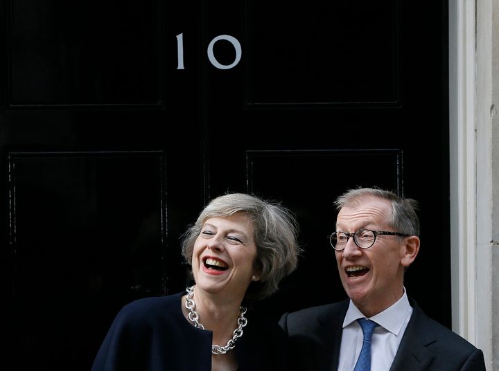 Theresa May has described her banker husband Philip as a 'rock'.