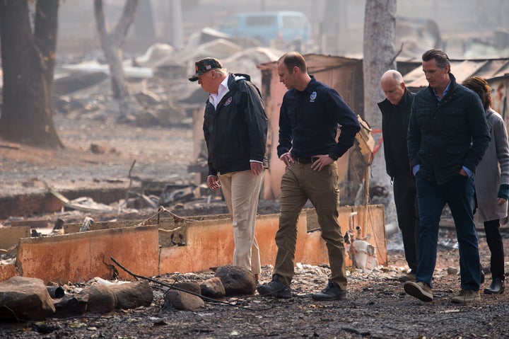 President Donald Trump toured areas affected by the deadly wildfires on Saturday.