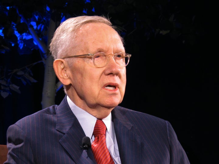 FILE - In this April 3, 2018, file photo, former Senate Majority Leader Harry Reid speaks during a joint appearance with former U.S. Secretary of State John Kerry during a lecture series at the University of Nevada, Reno. He may no longer lead Democrats in the U.S. Senate, but the political machine Reid built to turn Nevada blue is still humming along. Democrats romped up and down the state, ousting Republican Sen. Dean Heller and taking the governorship, lieutenant governor, attorney general and treasurer posts while expanding their state legislative control to supermajorities.(AP Photo/Scott Sonner, File)