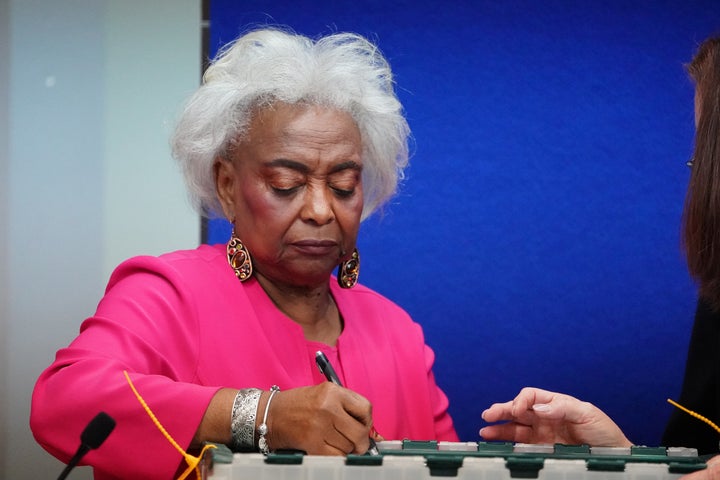 Broward County Supervisor of Elections Brenda Snipes signs a box during a ballot recount in Lauderhill, Florida, November 12.