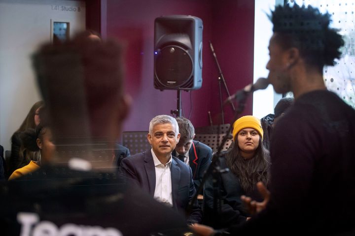 Khan watched aspiring young musicians in a recording studio during a visit to Spotlight youth centre in London.