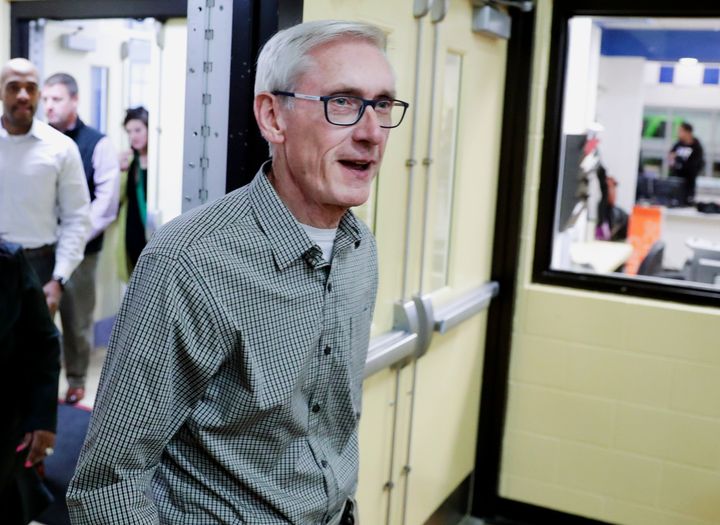 In this Nov. 7, 2018, file photo, Wisconsin Democratic Gov.-elect Tony Evers walks into a room before speaking with reporters in Madison, Wis. (Steve Apps/Wisconsin State Journal via AP, File)