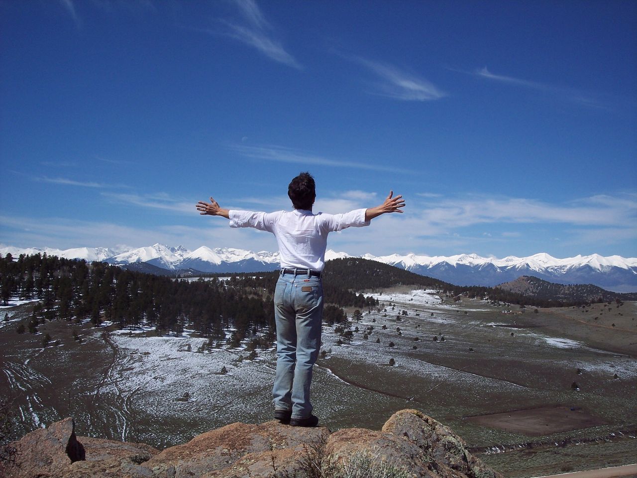 Phyllis embracing the Sangre de Cristo Mountains in 2005.