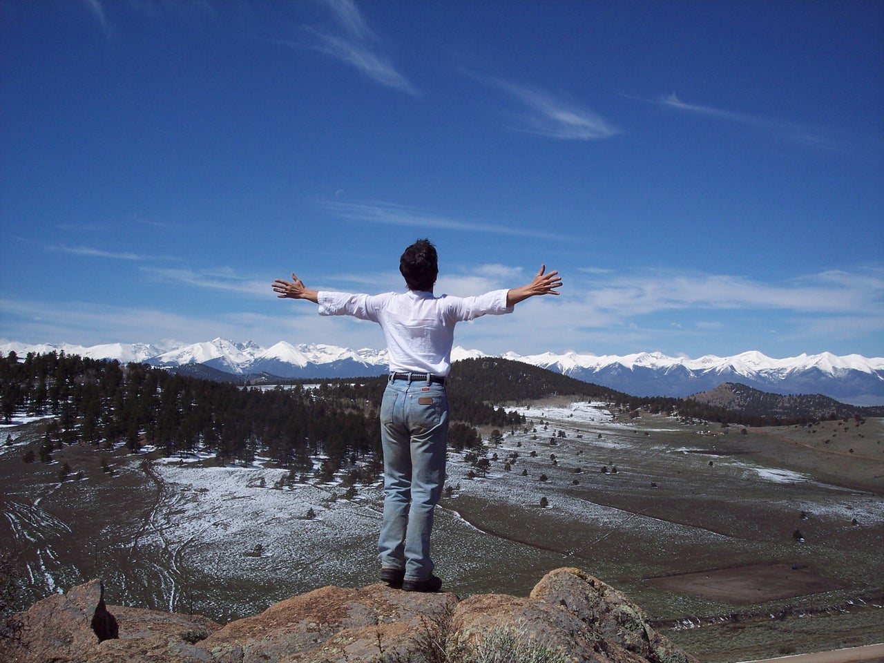 Phyllis embracing the Sangre de Cristo Mountains in 2005.