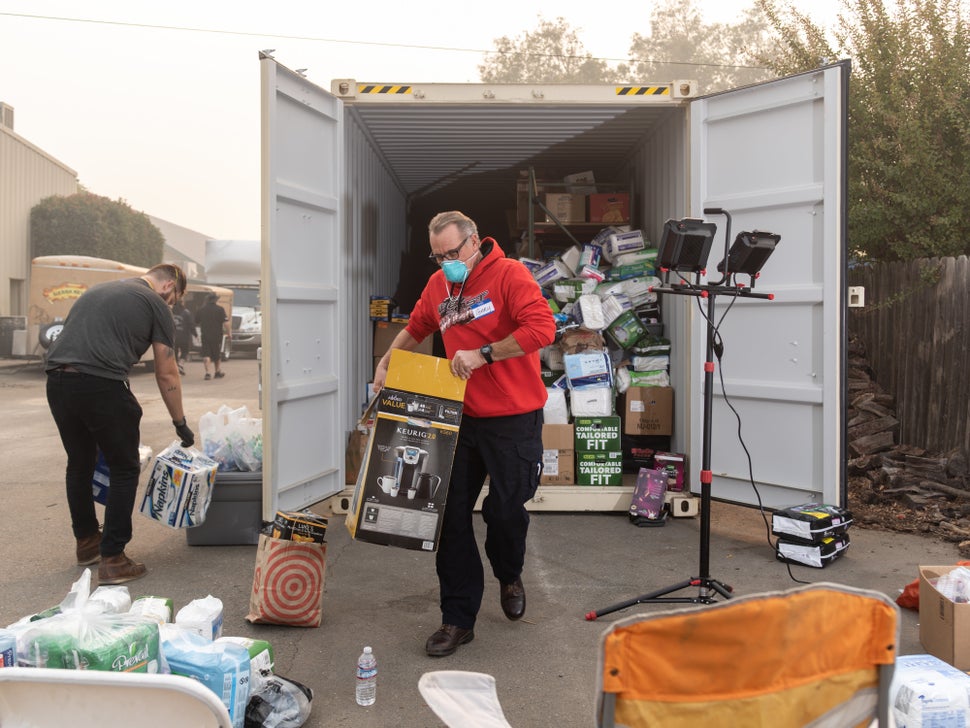 Gary P., from Red Bluff, California, volunteers by sorting toiletry items at the East Ave Church shelter.