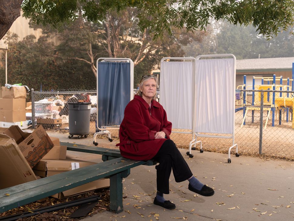 Libby Andresen outside of the shelter at East Ave Church. Andresen, her mother and brother were evacuated from their homes in Paradise, California.