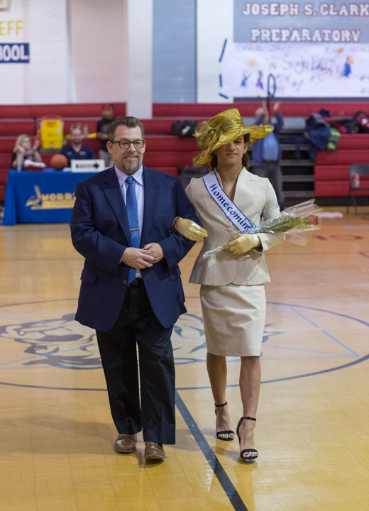 Dylan and J.D. walk on court for the homecoming game.