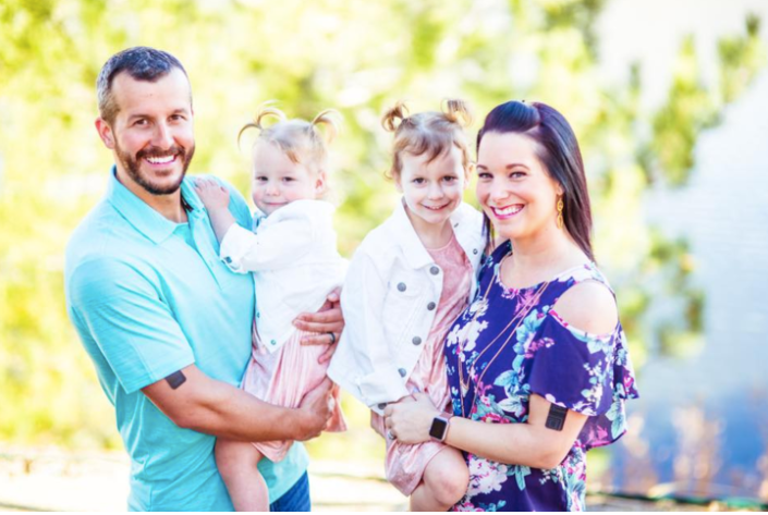 Shanann Watts (far right) poses with her husband, Chris, and their two daughters, Celeste and Bella, in a picture posted to h