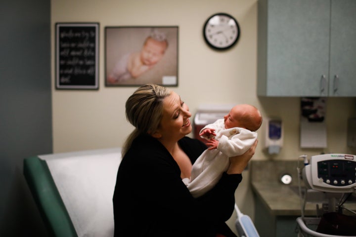 Rachelle Sanders with her infant son, Lincoln.