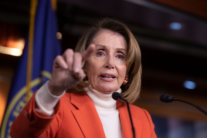 House Minority Leader Nancy Pelosi (D-Calif.) talks to reporters Thursday. With Democrats retaking control of the House, the plan is to wait to revisit immigration next year.