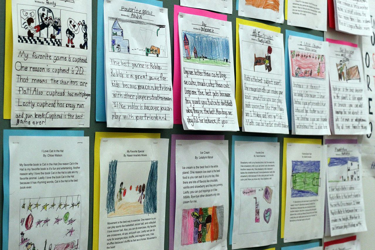 he classroom walls of Mott Haven Academy Charter School are covered in student work. 