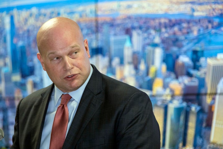 Acting Attorney General Matthew Whitaker, framed by a photograph of lower Manhattan, addresses law enforcement officials at the Joint Terrorism Task Force on Nov. 21, 2018, in New York.