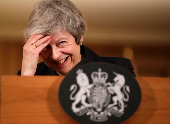 May laughs off her mistake during her press conference last Thursday