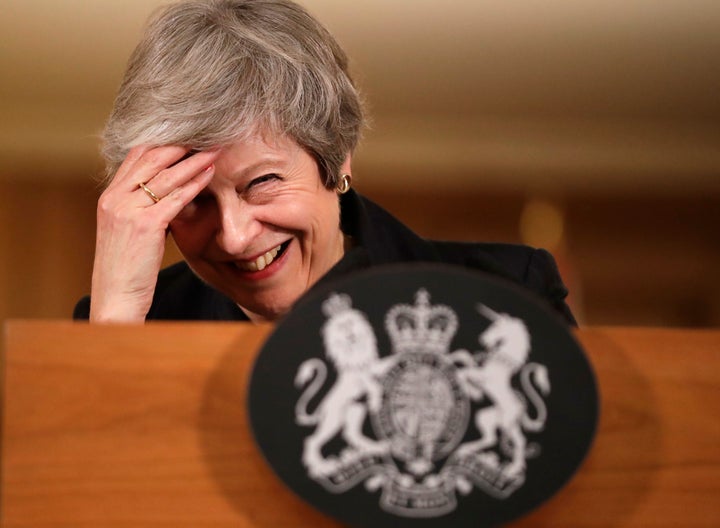 May laughs off her mistake during her press conference last Thursday