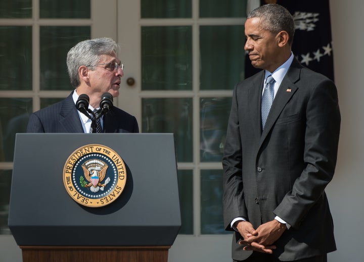 US Supreme Court nominee Merrick Garland looks at President Barack Obama after he announced his nomination in the Rose Garden at the White House in Washington, D.C., on March 16, 2016.