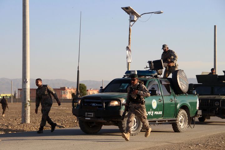 Afghan security forces arrive near the site after a suicide bomber blew himself up inside a packed mosque on an Afghan army base in Khost province on November 23, 2018. (FARID ZAHIR/AFP/Getty Images)