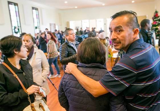 Samuel Oliver-Bruno glances back at CityWell United Methodist Church in Durham, N.C. where he had taken refuge to avoid deportation.