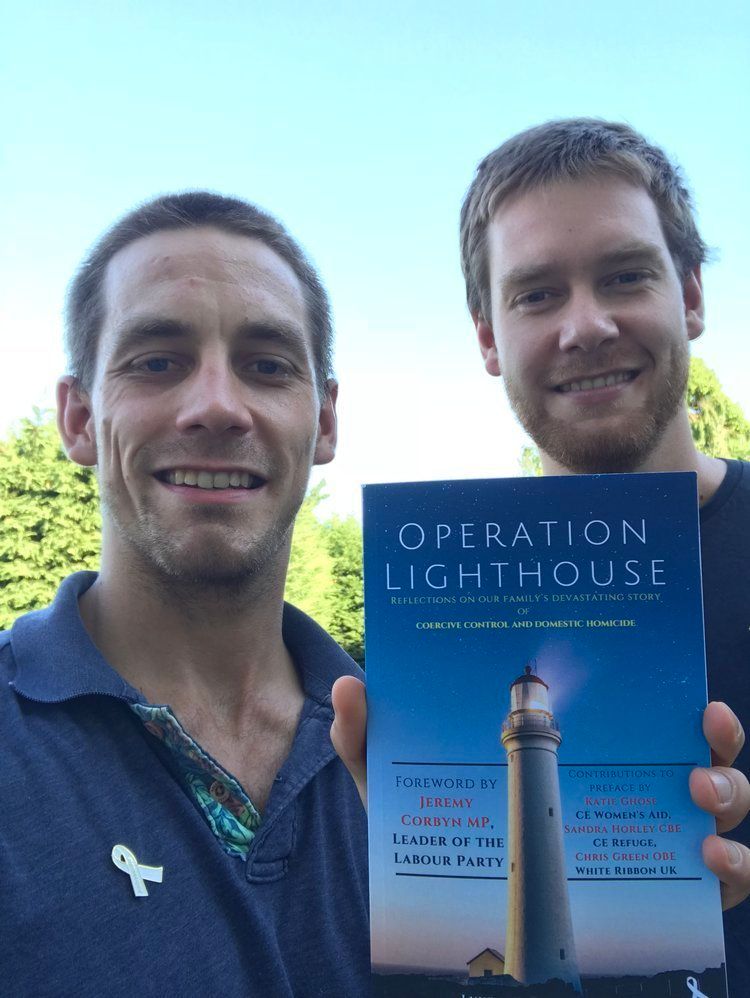 Ryan and Luke Hart with their book.