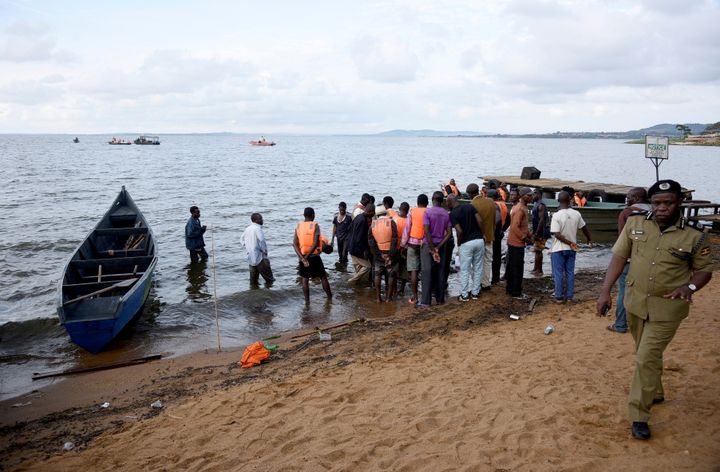 Rescue and recovery missions gather at the shores of Lake Victoria during the search for the bodies of dead passengers after a cruise boat capsized off Mukono district, Uganda, on November 25, 2018.