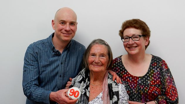 Joan Blass with her daughter Daphne Franks and son Michael Blass at her 90th birthday party