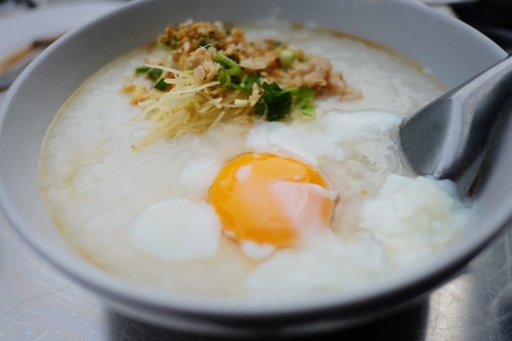 Congee serves as the perfect vessel for our need to "put an egg on it."