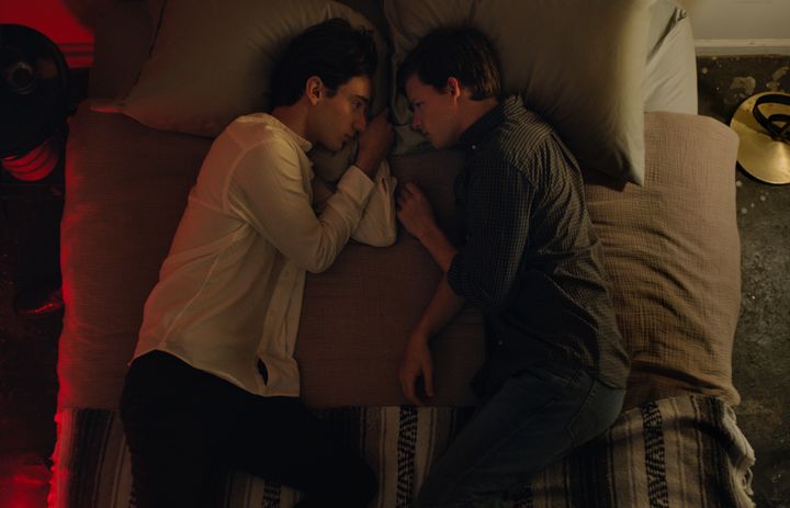 Theodore Pellerin (left) and Lucas Hedges share an intimate moment in "Boy Erased," now playing in theaters nationwide.