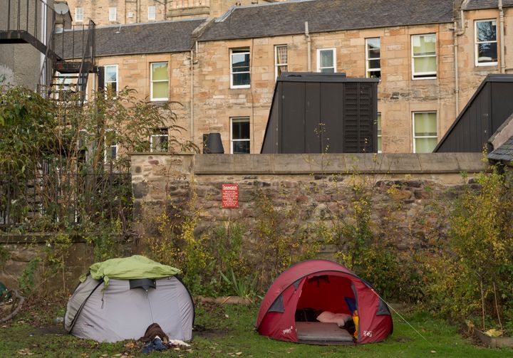 Rough sleepers pitch tents on a patch of grass in Edinburgh, Scotland this month.