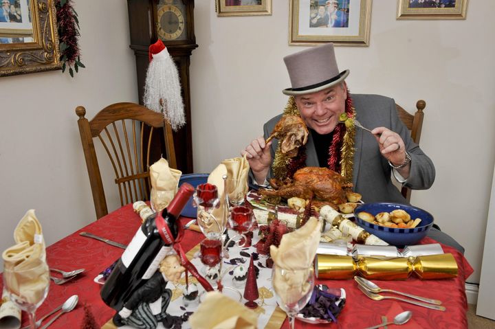 Andy tucks into a Christmas dinner. He's eaten thousands of them in his lifetime. 
