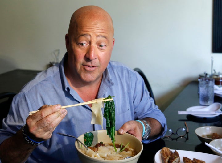 Andrew Zimmern samples Taiwanese noodle soup and pork roll at Happy Stony Noodle in Elmhurst, Queens, in New York.