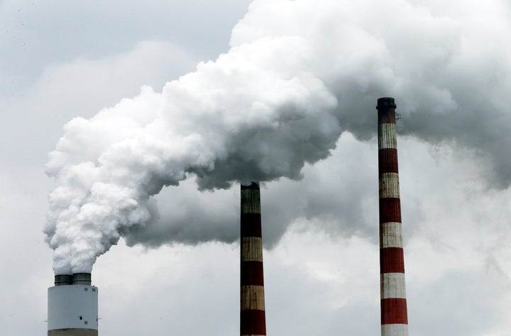 Steam pours out of a smokestack at the Morgantown Generating Station, a coal- and oil-burning power plant in Newburg, Maryland.