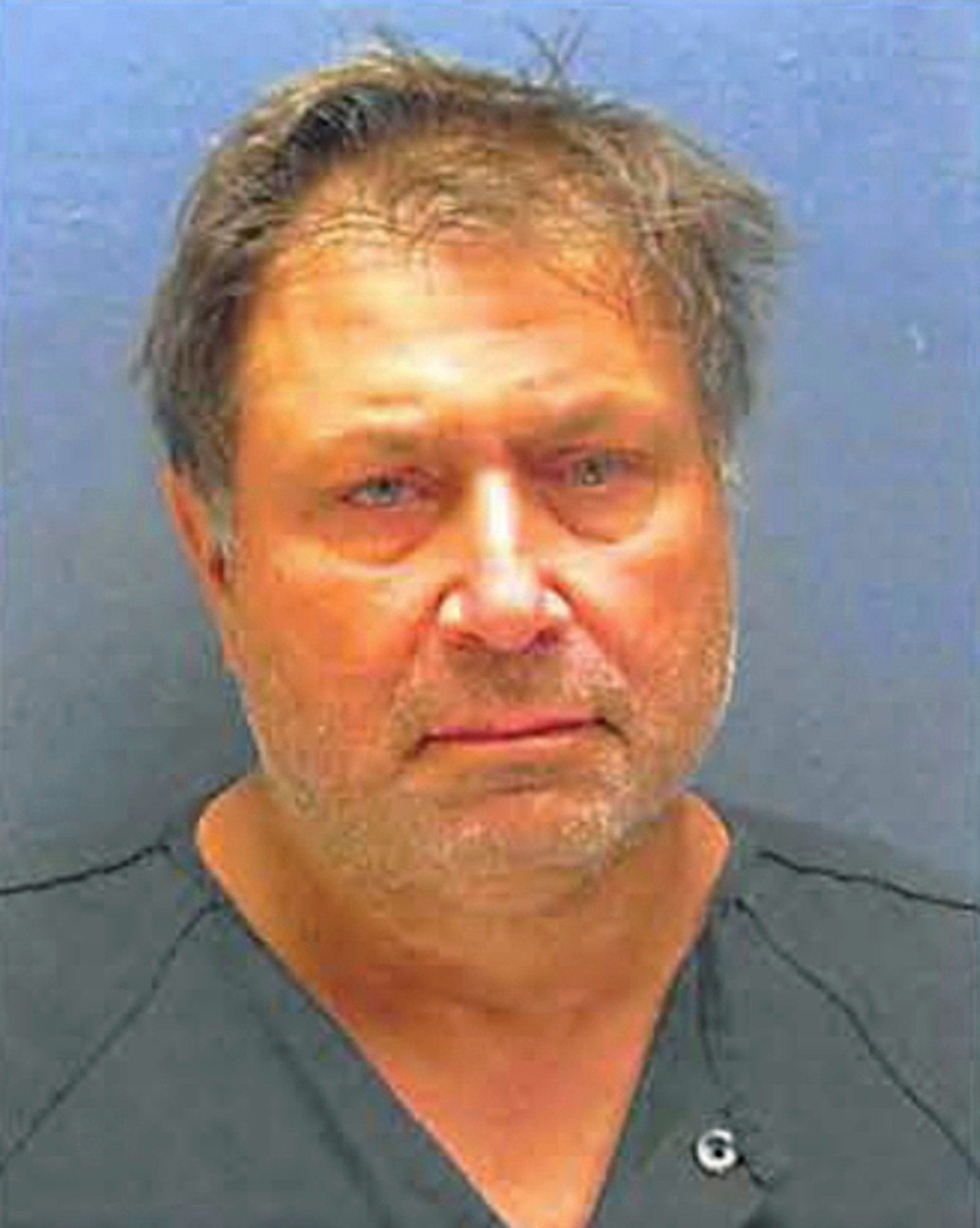 Murder charges filed against brother in mansion fire slayings