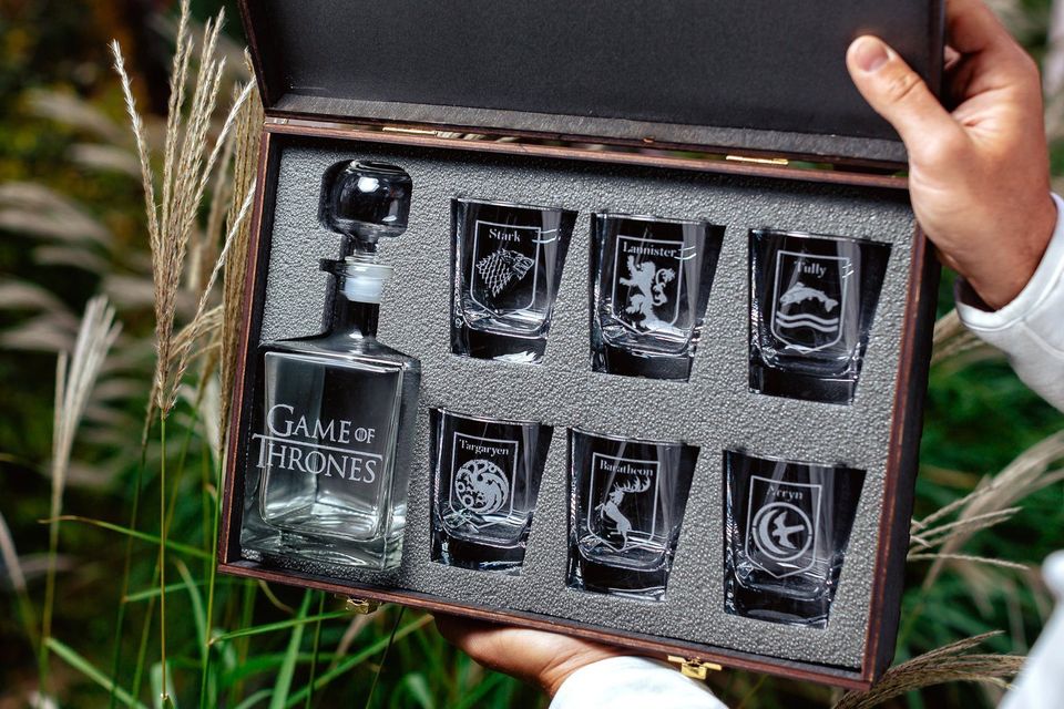 A whiskey set with their favorite houses.