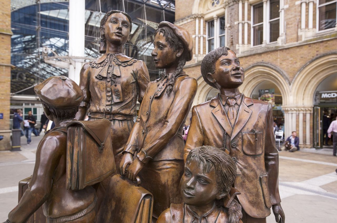 Kindertransport - the arrival. A memorial by Frank Meisler at Liverpool Street Station in London, where trains of children fleeing from Nazi tyranny arrived in England