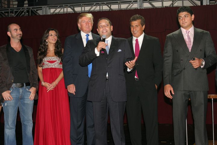 Felix Sater (center, holding the microphone) attends a launch party for the Trump Soho Hotel Condominium in Manhattan on Sept. 19, 2007.