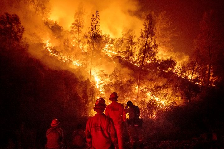 Firefighters battle the Ranch fire, part of the Mendocino Complex fire near Ladoga, California, in August.