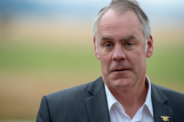 Interior Secretary Ryan Zinke signs a Public Lands Order at a ceremony in Emigrant, Montana, in October. 