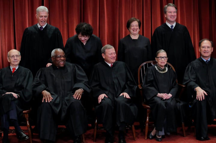 Standing in the top row are Associate Justice Neil Gorsuch, Associate Justice Sonia Sotomayor, Associate Justice Elena Kagan