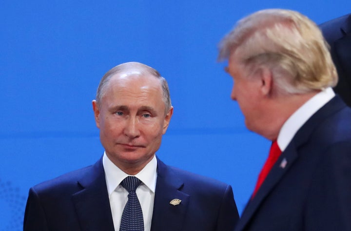 President Donald Trump and Russia's President Vladimir Putin are seen during the G-20 summit in Buenos Aires, Argentina, on Friday.