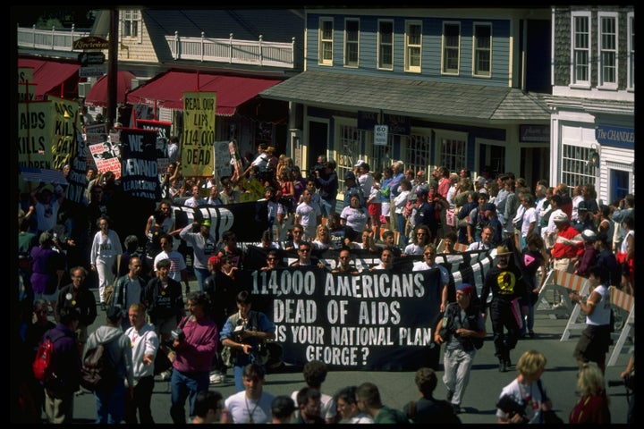 Protesters march near George H.W. Bush's vacation home in Kennebunkport, Maine, in September 1991.