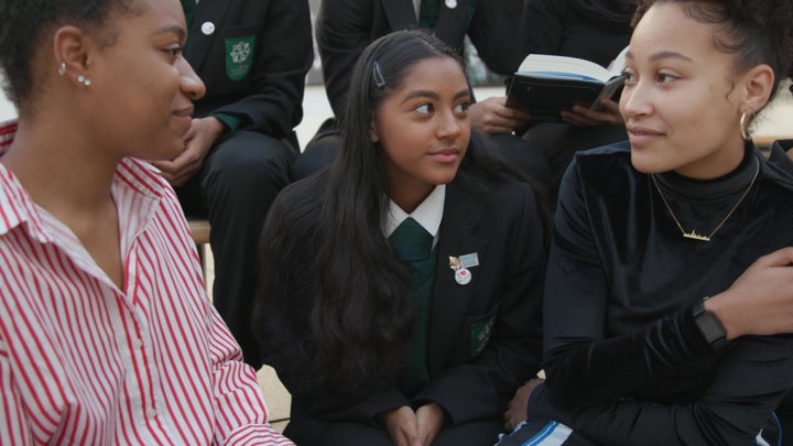 Renée, left, and Dania, right, with pupils from Elmgreen School.