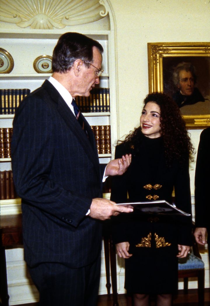 President George H.W. Bush with singer Gloria Estefan at the White House in 1990.