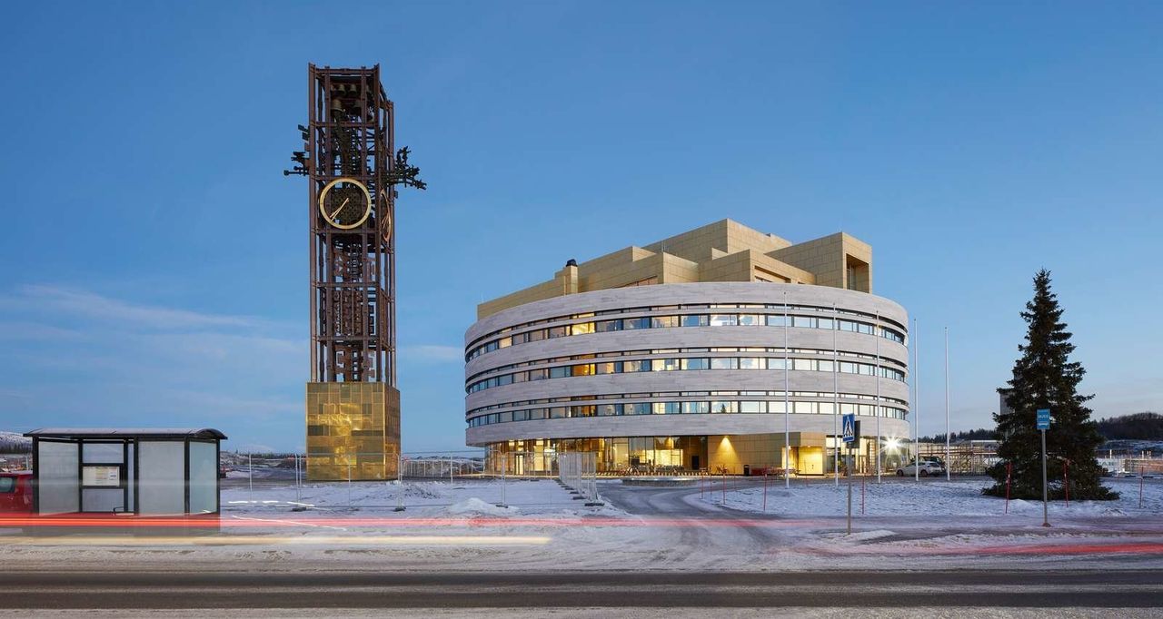 The new City Hall in Kiruna's relocated city center. To tie the old in with the new, the clocktower previously perched on top of the old City Hall has been moved beside it.