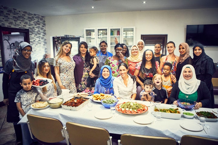 The Duchess of Sussex with the women of the Hubb Community Kitchen at Al Manaar Muslim Cultural Heritage Centre in West Londo