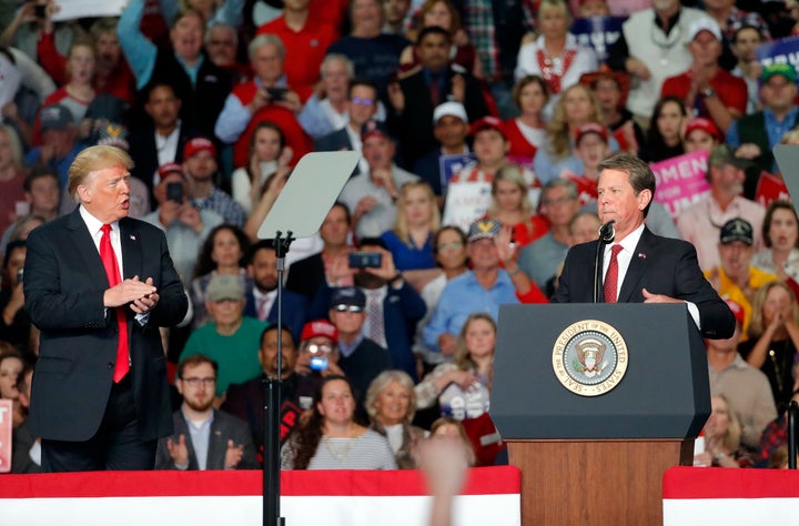 Then-candidate for governor Brian Kemp (R) at a campaign rally with President Donald Trump on Nov. 4 in Macon, Georgia. 