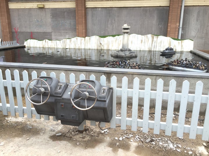 The boat formed part of an exhibit at Banksy's Dismaland, which he set up in a disused swimming pool complex in Weston-super-Mare in southwest England in the summer of 2015.