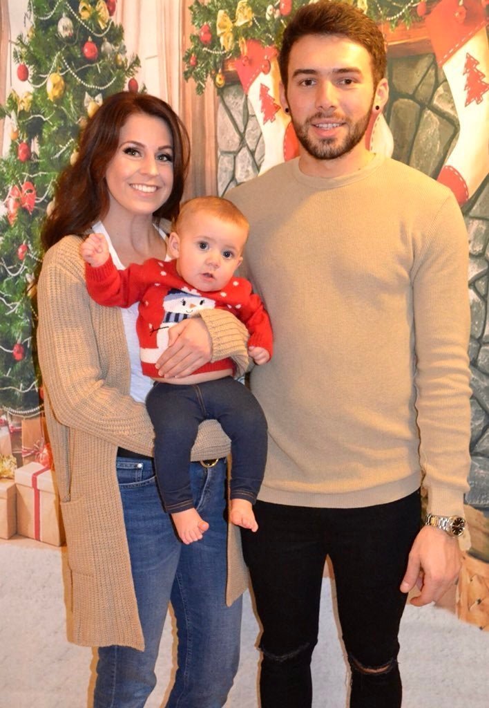 Lindsay Womack with finance Andrew Pickering and their daughter Mia. 