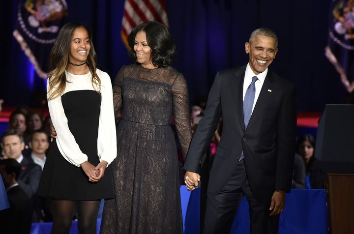 The Obamas with their eldest daughter, Malia. 