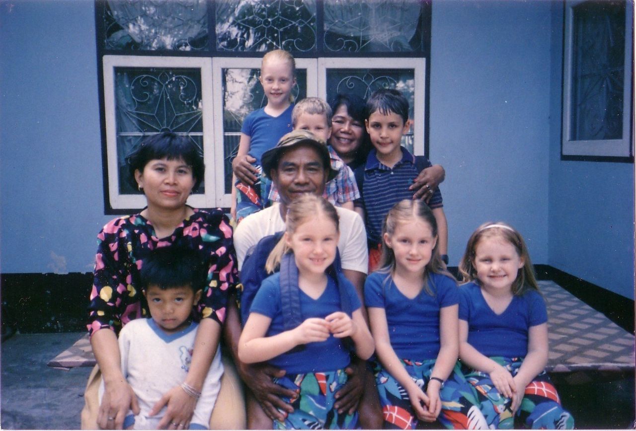 The author (first row, second from right) and several of her siblings witnessing to Thai locals (1987).